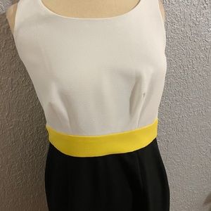 2 pieces yellow white and black suit. Worn once